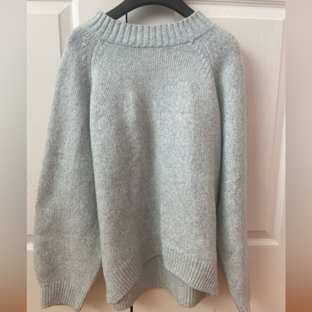 Light blue sweater for young teens